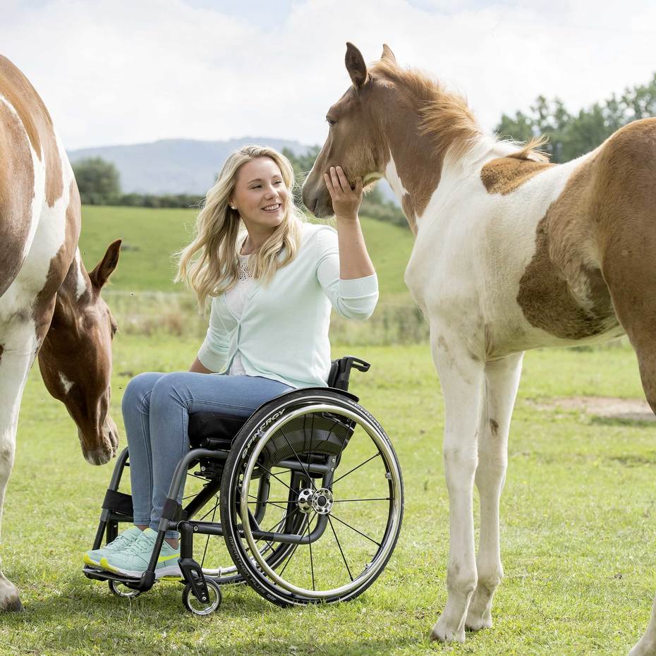 Svenja in her Avantgarde DS wheelchair for active use in a paddock.