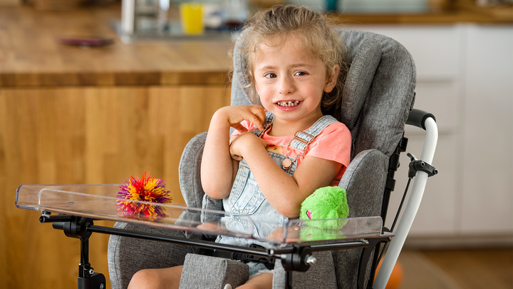 Ottobock Kimba Home with user Emilia in the living room