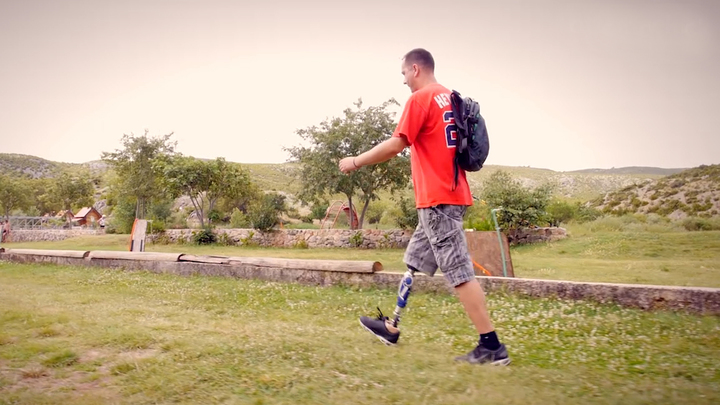User walks through the garden