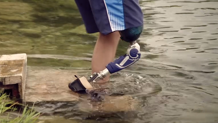 User goes swimming in the river