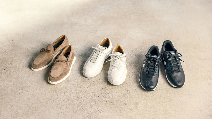 Three pairs of men's shoes lined up side by side.
